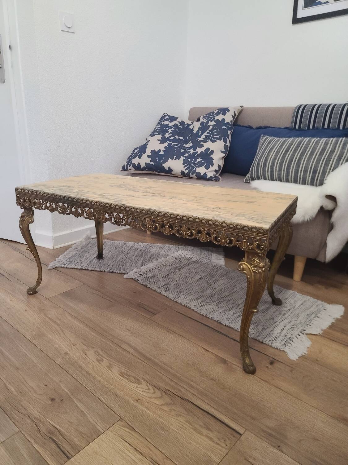 Marble coffee table with brass legs