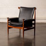 Finished Juhl armchair and its ottoman.