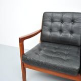 Senator sofa with black leather cushions by Ole Wascher for France and Son