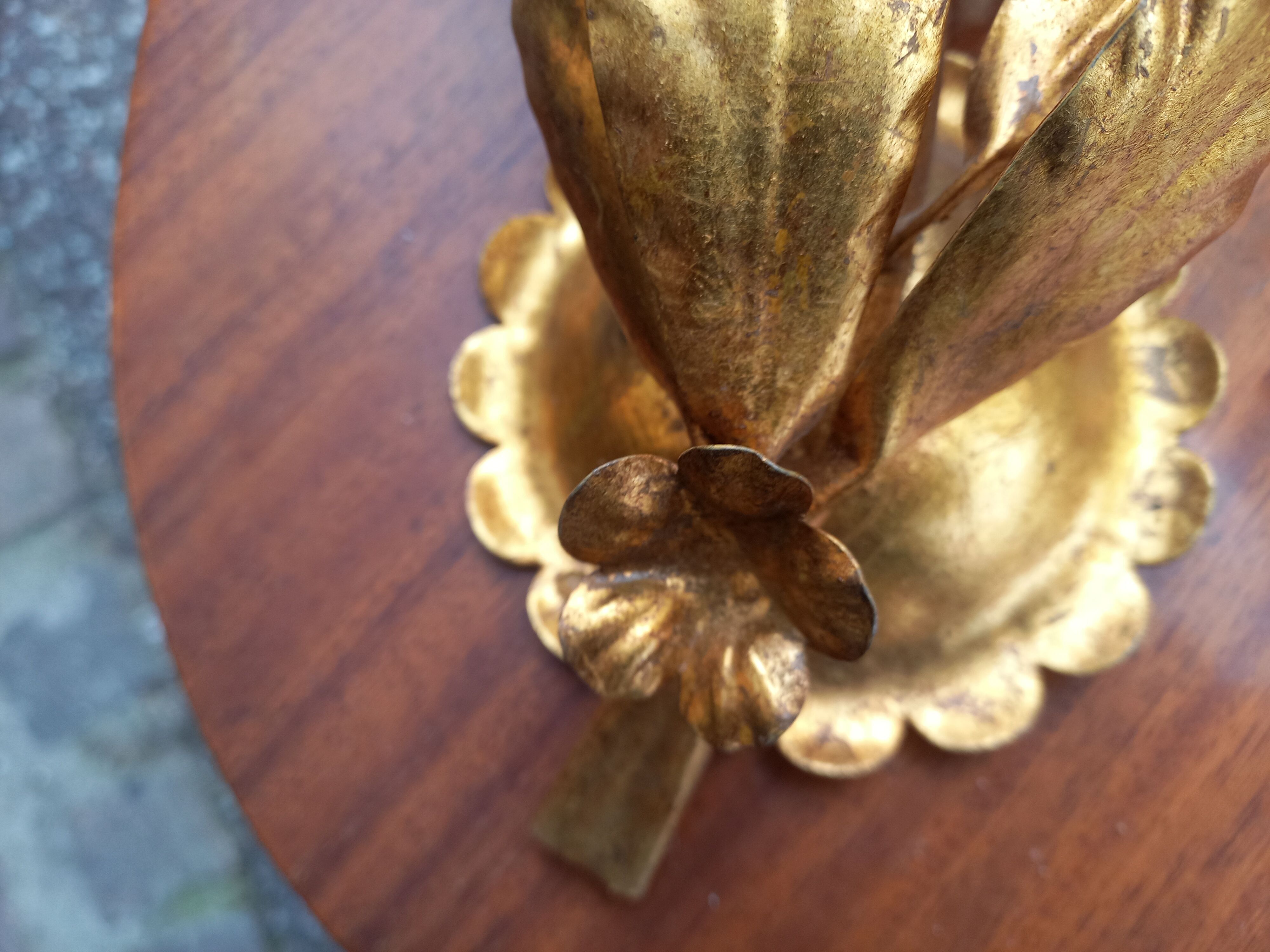 Pair of gold leaf sconces