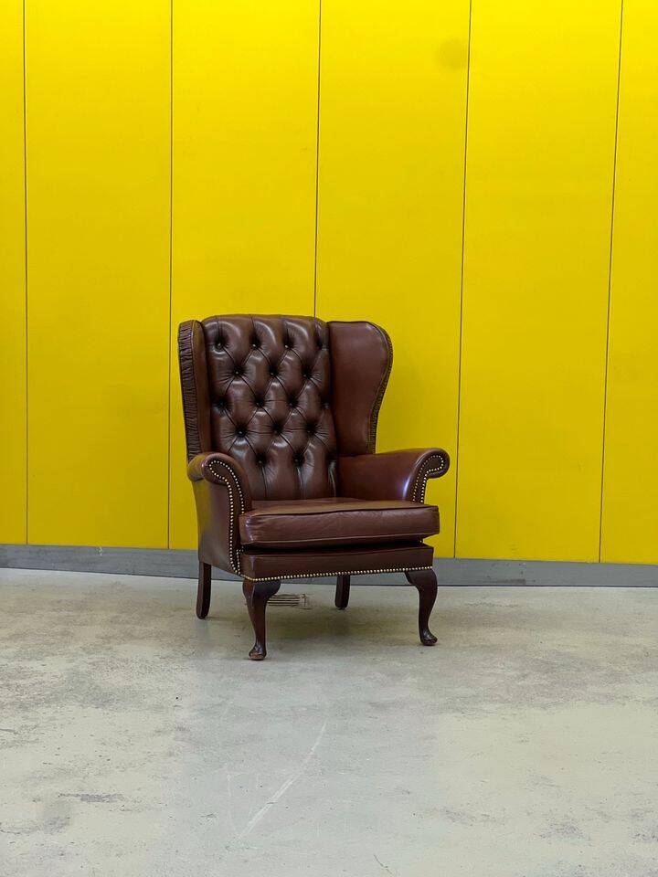 Fauteuil Chesterfield traditionnel anglais en cuir