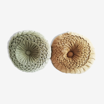 Pair of round pleated velvet cushions