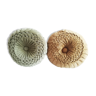 Pair of round pleated velvet cushions