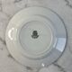 Set of 17 flat plates in Saint Amand earthenware, 22.5cm.