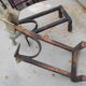 Old pair of wrought iron and bronze pegs