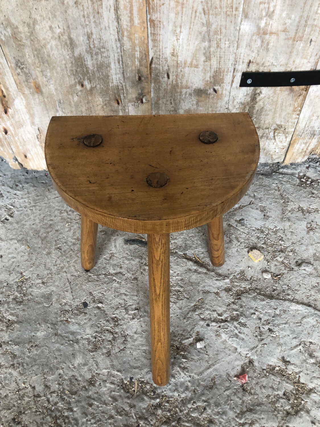 Vintage light wood milking stool