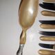 29-piece horn cutlery set, knives and serving utensils.