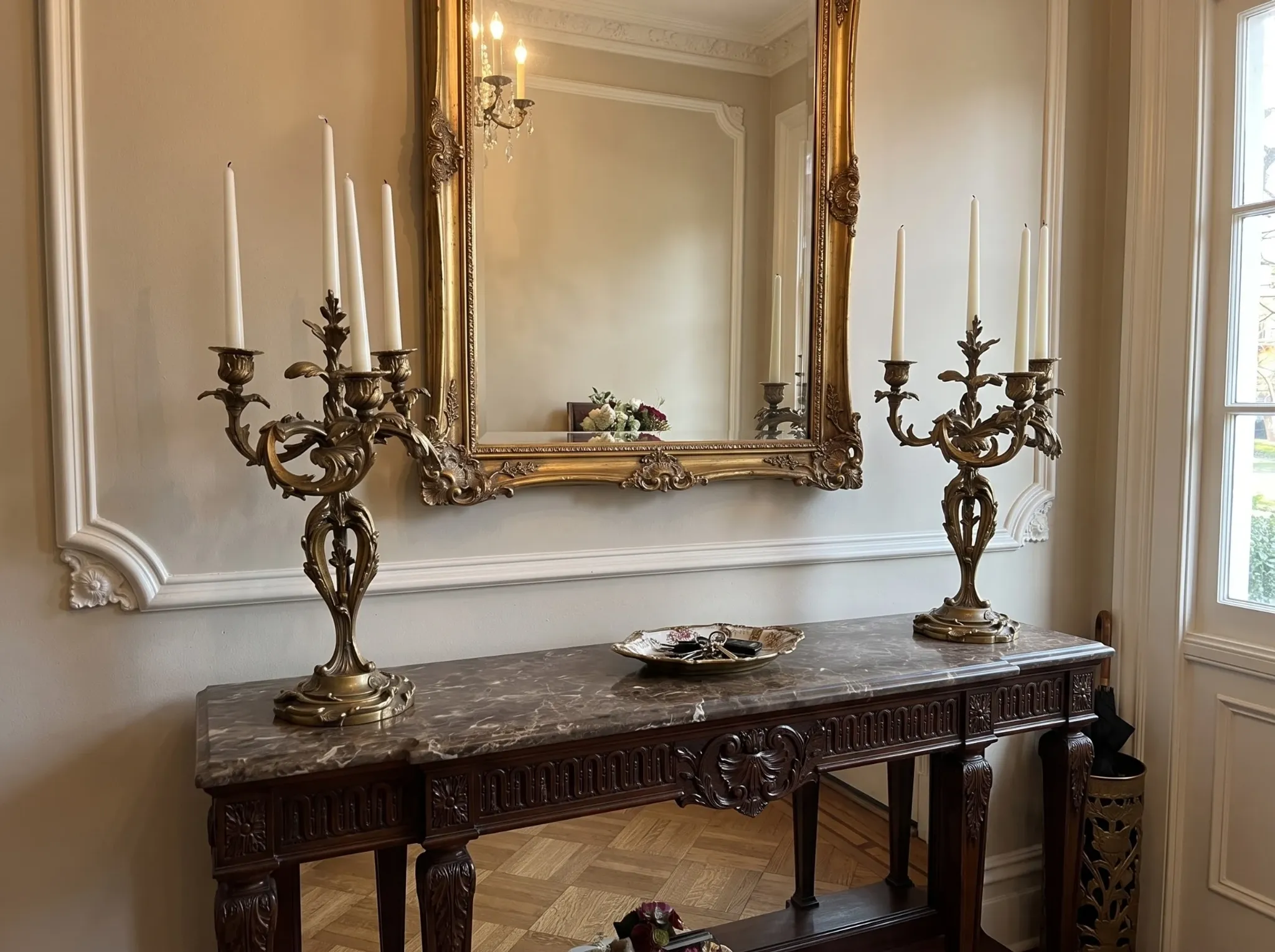 Pair of Louis XV style bronze candlesticks from the 19th century.
