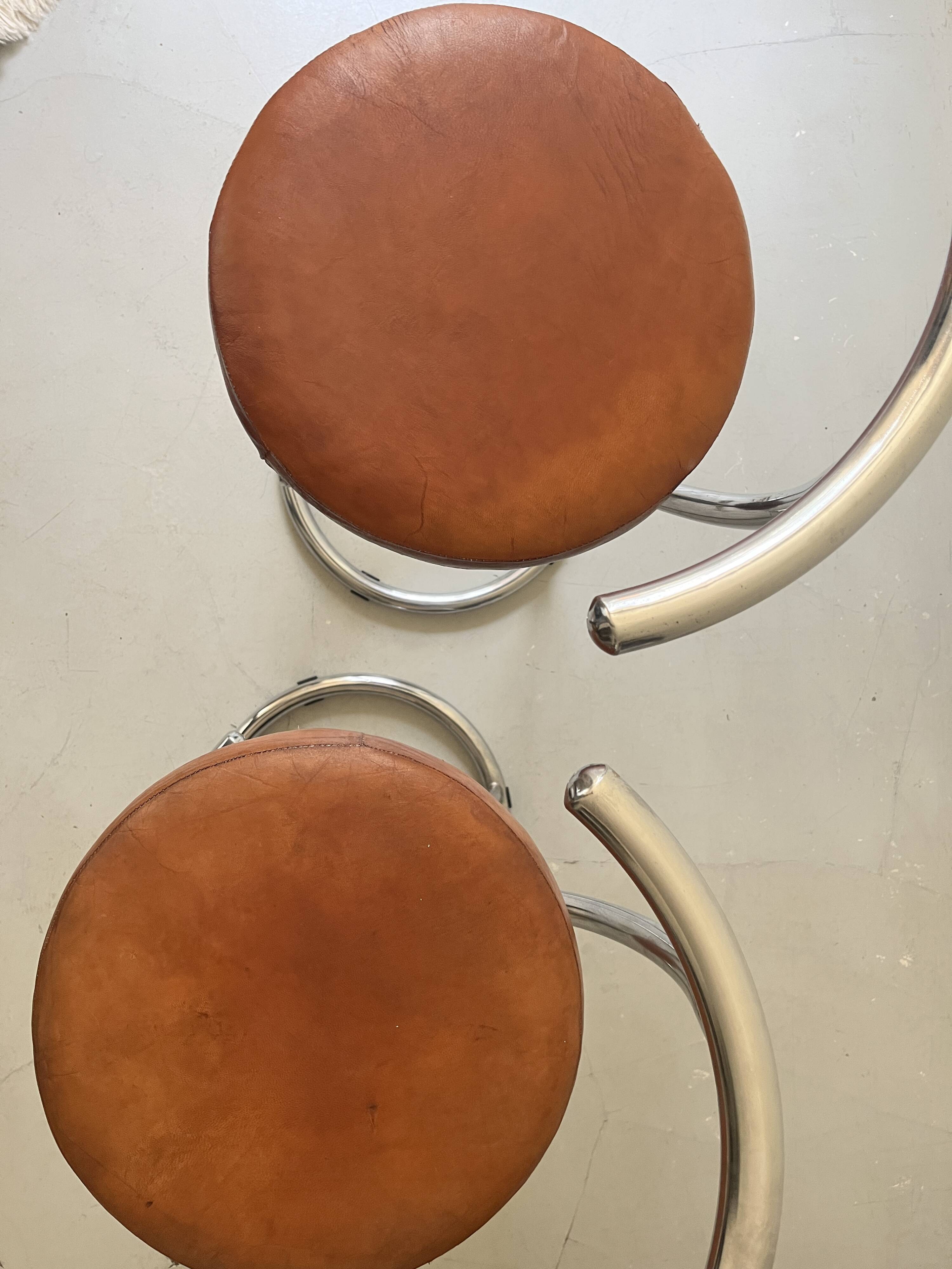 Bar stools in tubular chrome and tan leather, 1970s