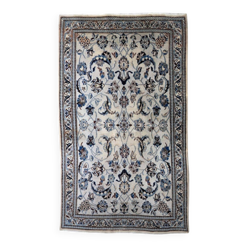 1950s hand-knotted wool rug with silk highlights, ivory and blue, 118 × 200 cm