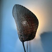 Woven rattan wall light in the style of Igno Maurer, design from the 1970s.