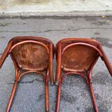 2 curved solid wood bistro chairs in Bordeaux.