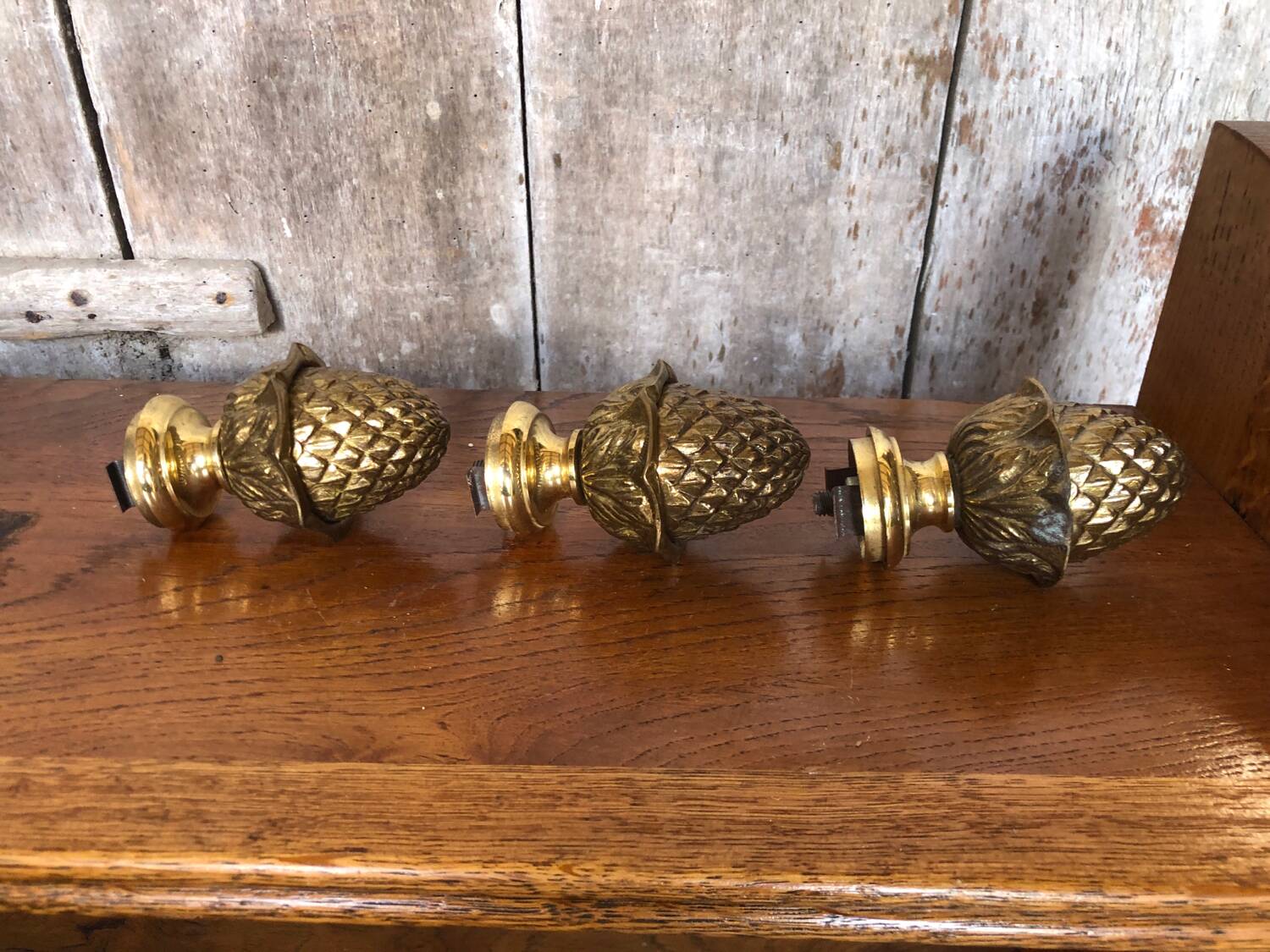 Set of 3 pine cones curtain rod golden bronze