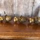 Set of 3 pine cones curtain rod golden bronze