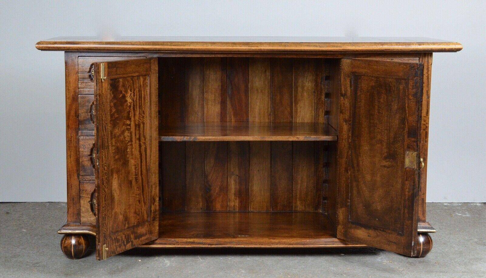 Rustic walnut sideboard with inlaid parquetry, vintage quality.