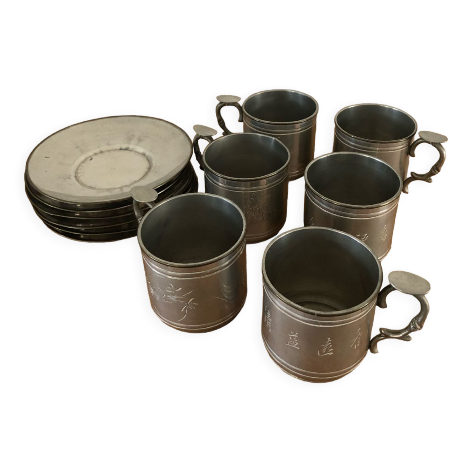 6 cups and sub-cups in pewter motifs birds and flowers and Chinese inscription