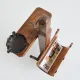 Vintage leather magazine rack with shelf and Brutalist / Rustic ashtray.