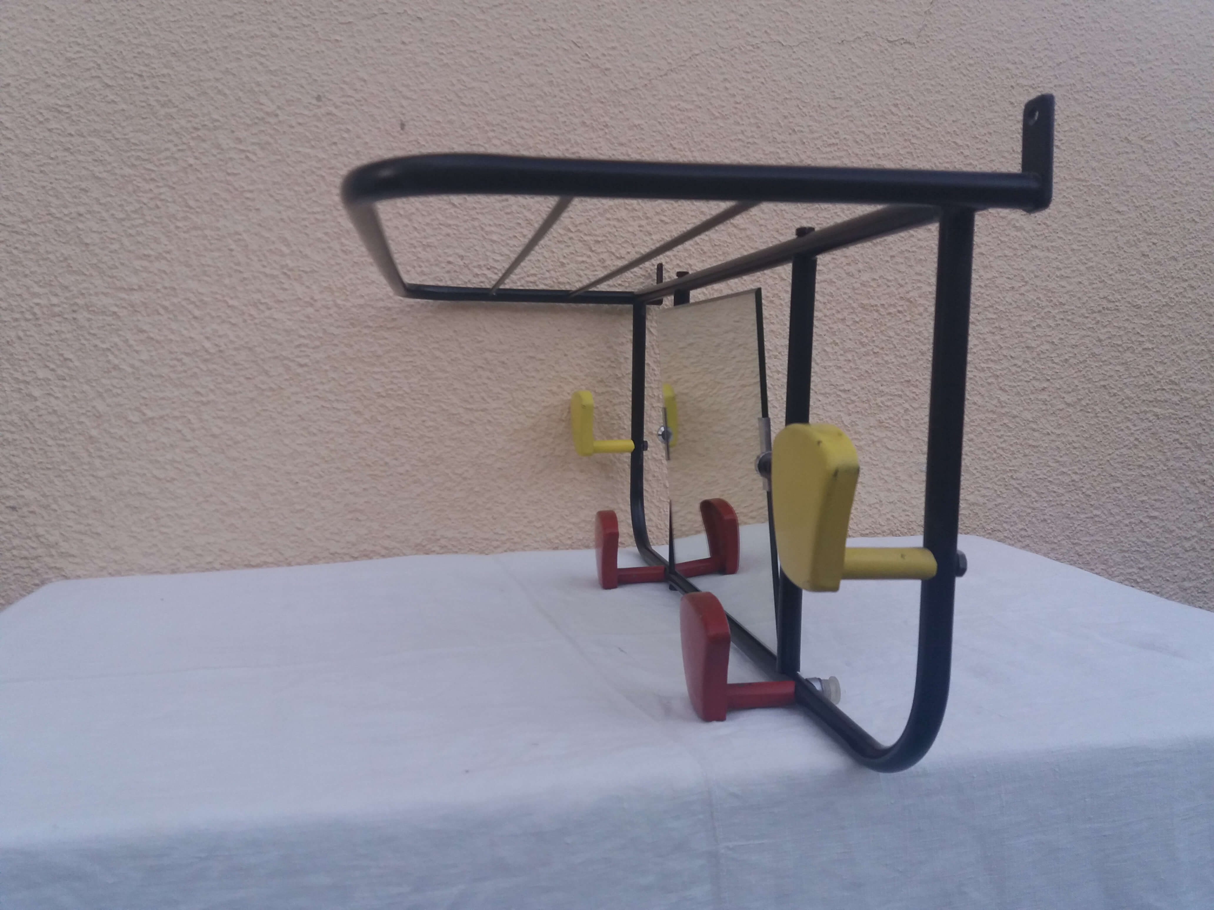 Wall coat holder with mirror