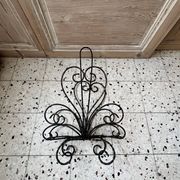 Wrought iron magazine rack
