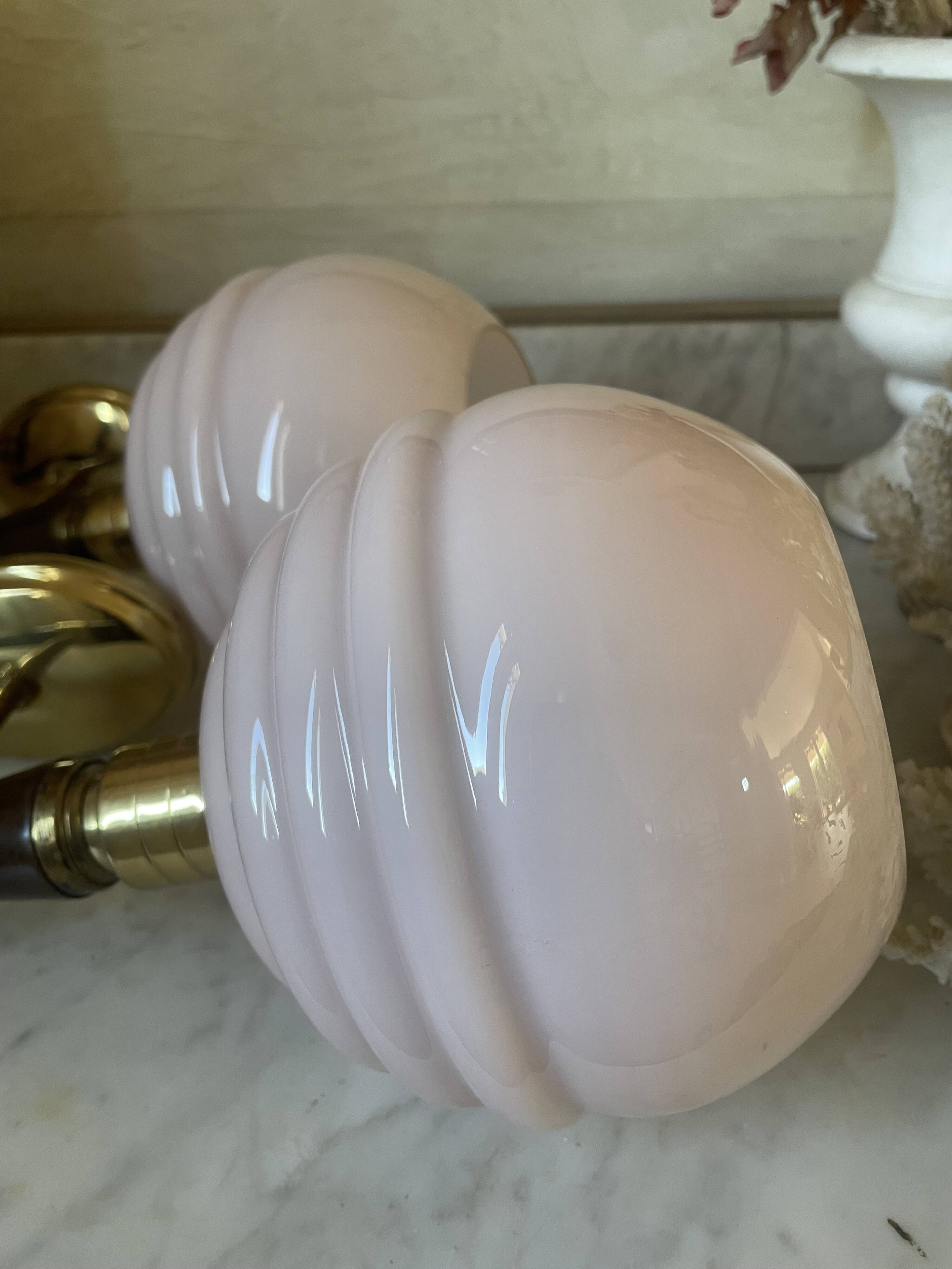Pair of wall lights in wood, brass, and pink opaline.