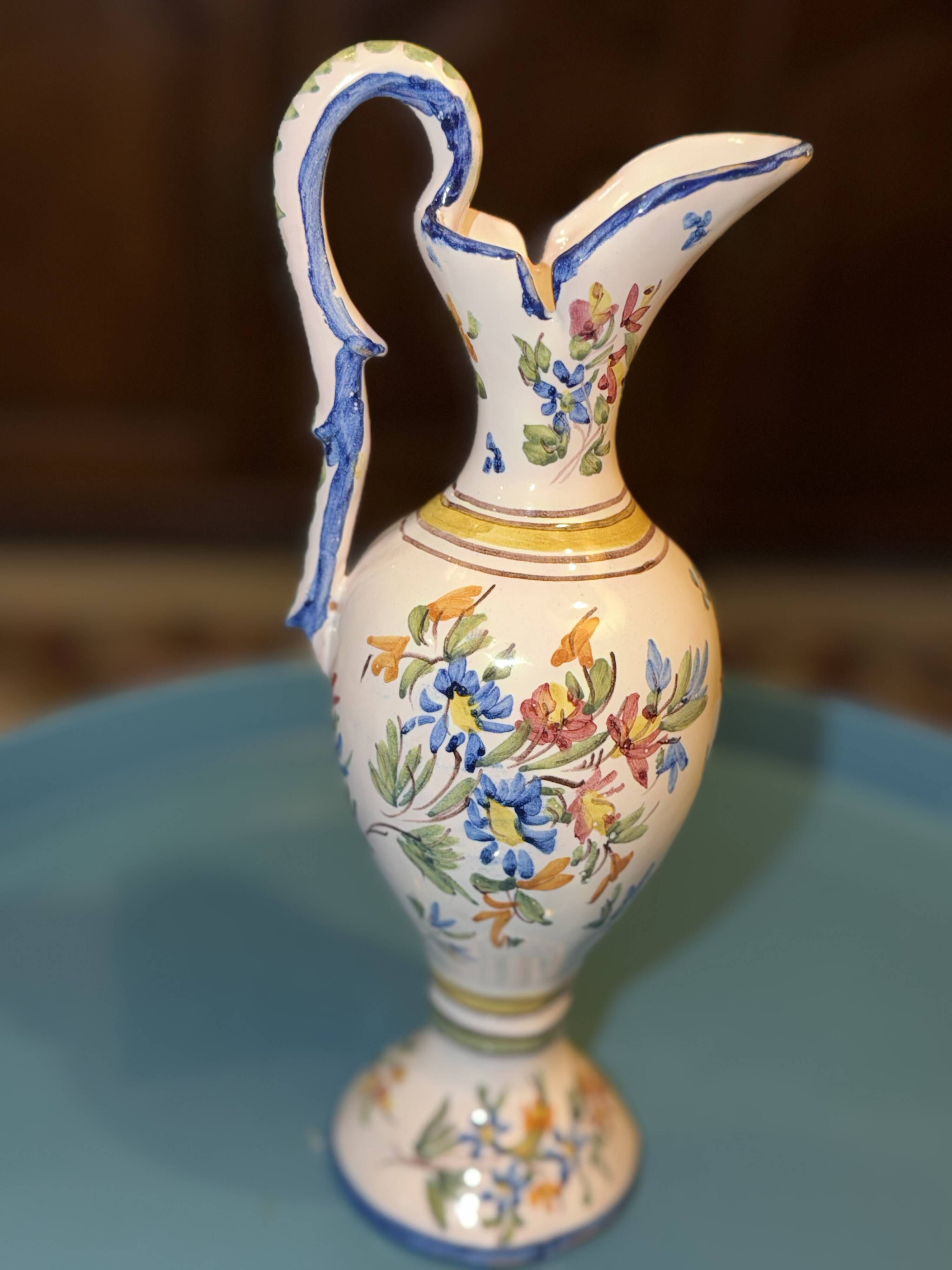 Jug / Pitcher in earthenware with floral decoration in Rouen style signed M.F.