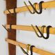 Rare coat rack by Carl Auböck with hat rack, cabinet, brass, walnut and beech, 1950s.