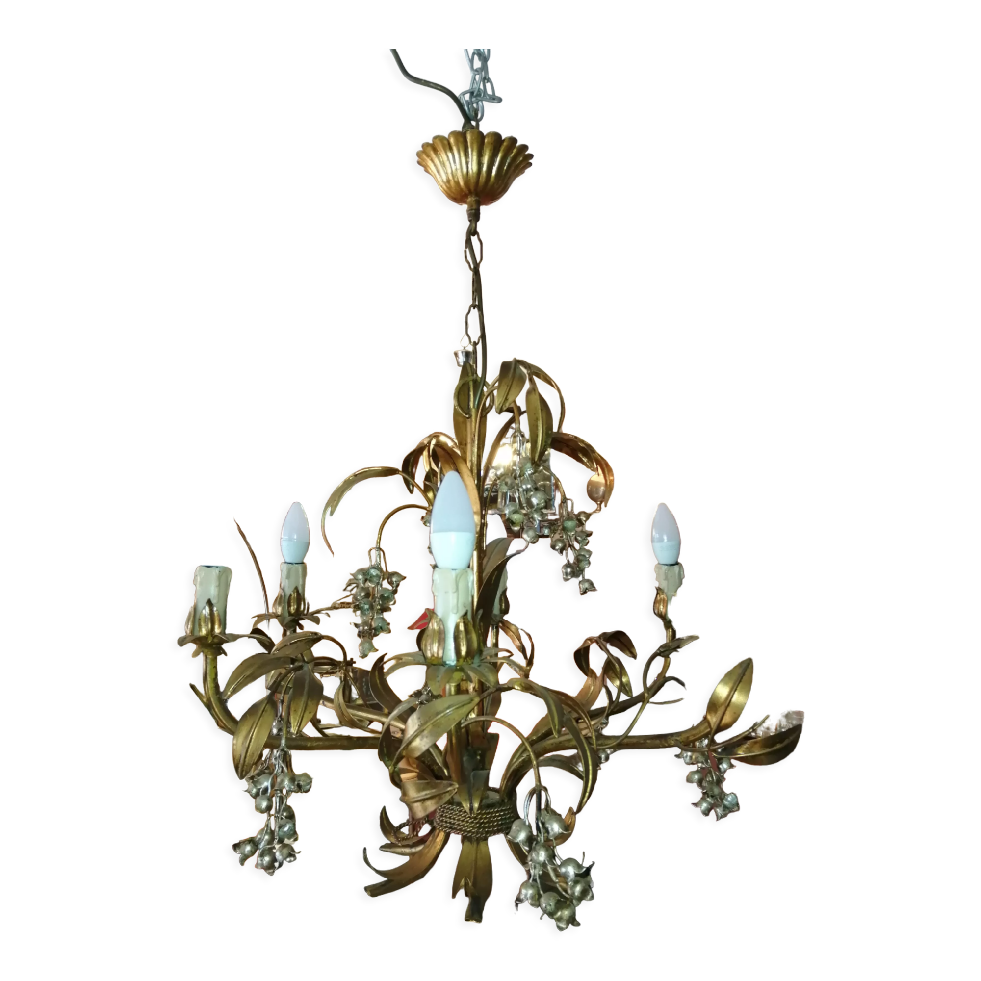Gilded brass chandelier and silver lily of the valley bells