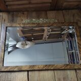 Miroir biseauté ciselé bois art déco dorure