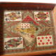Ancient game of yellow wooden dwarf with pawns