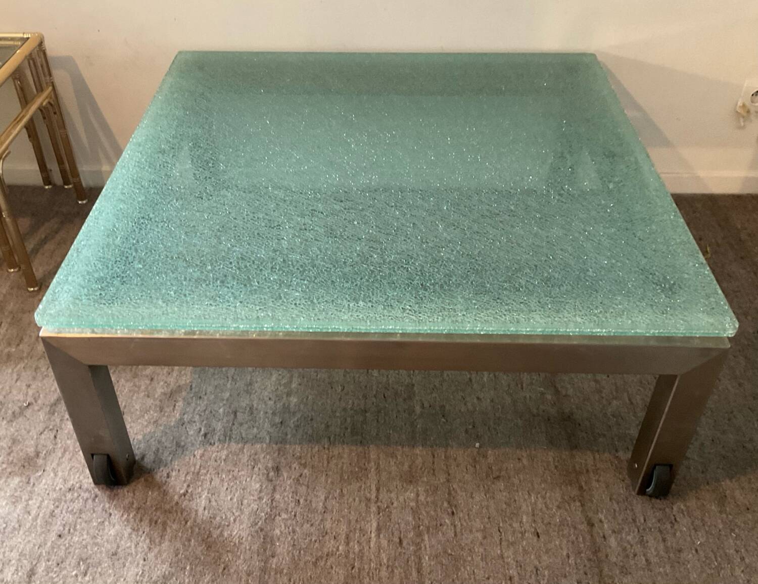 Designer garden coffee table in tempered glass and stainless steel