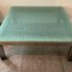 Designer garden coffee table in tempered glass and stainless steel