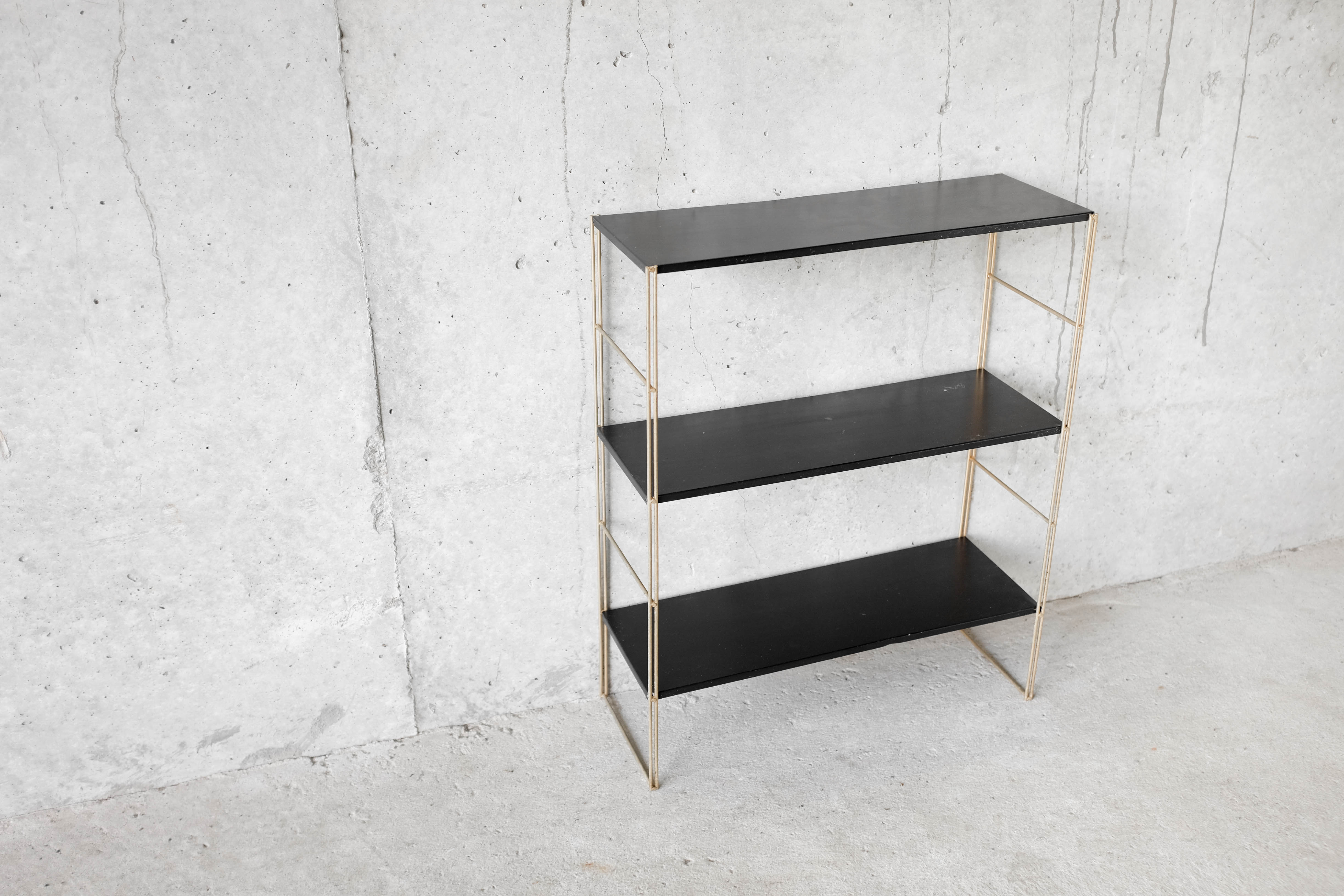 Brass string shelf