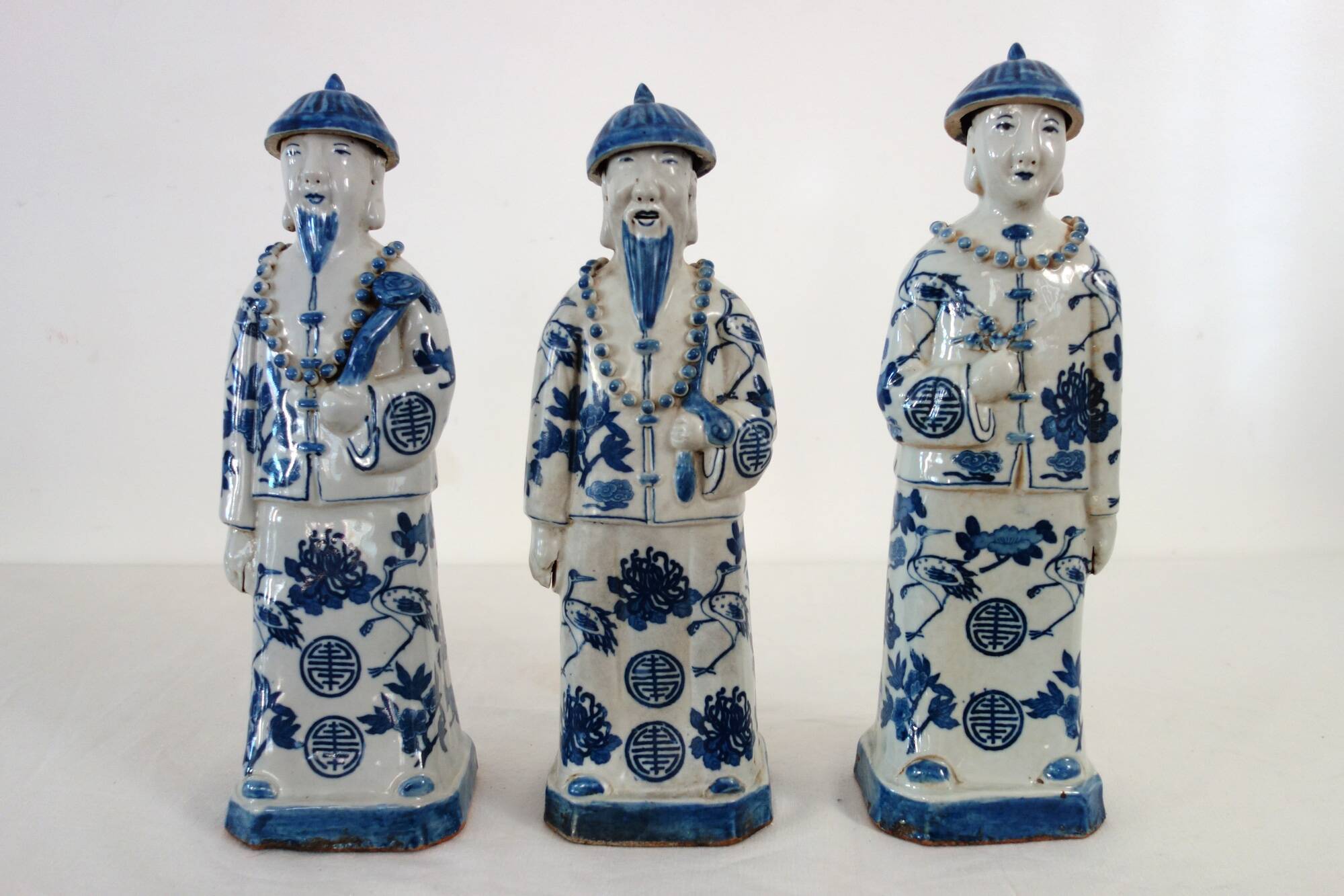 3 figurines of emperors from the Qing dynasty, China, early 20th century.