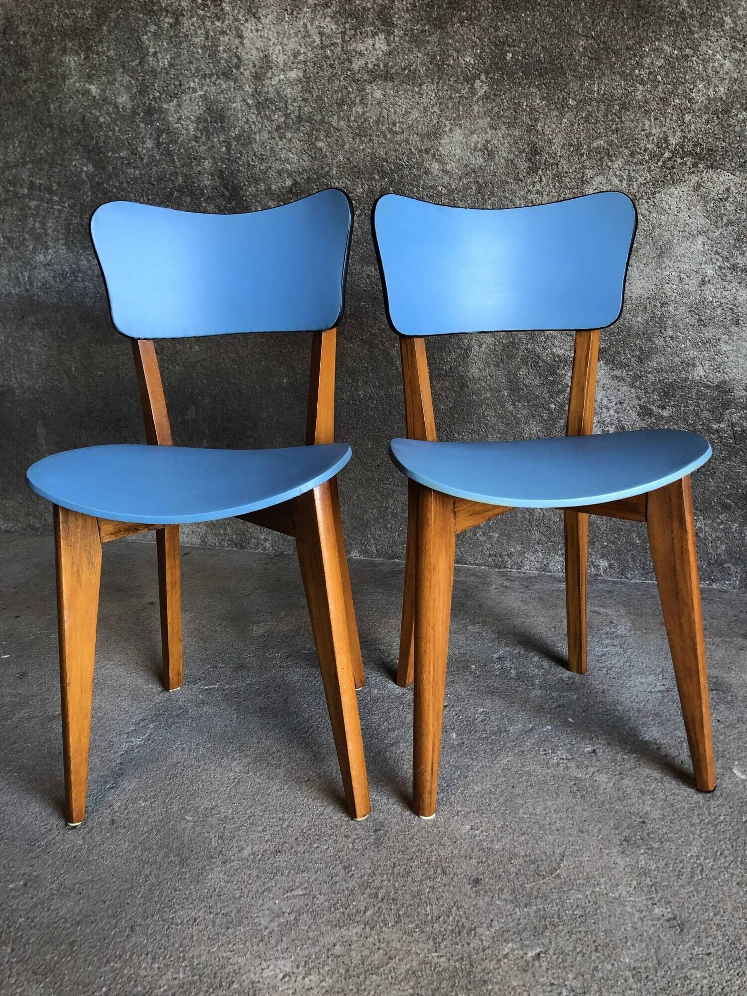 Pair of vintage bistro chairs in wood and light blue vinyl