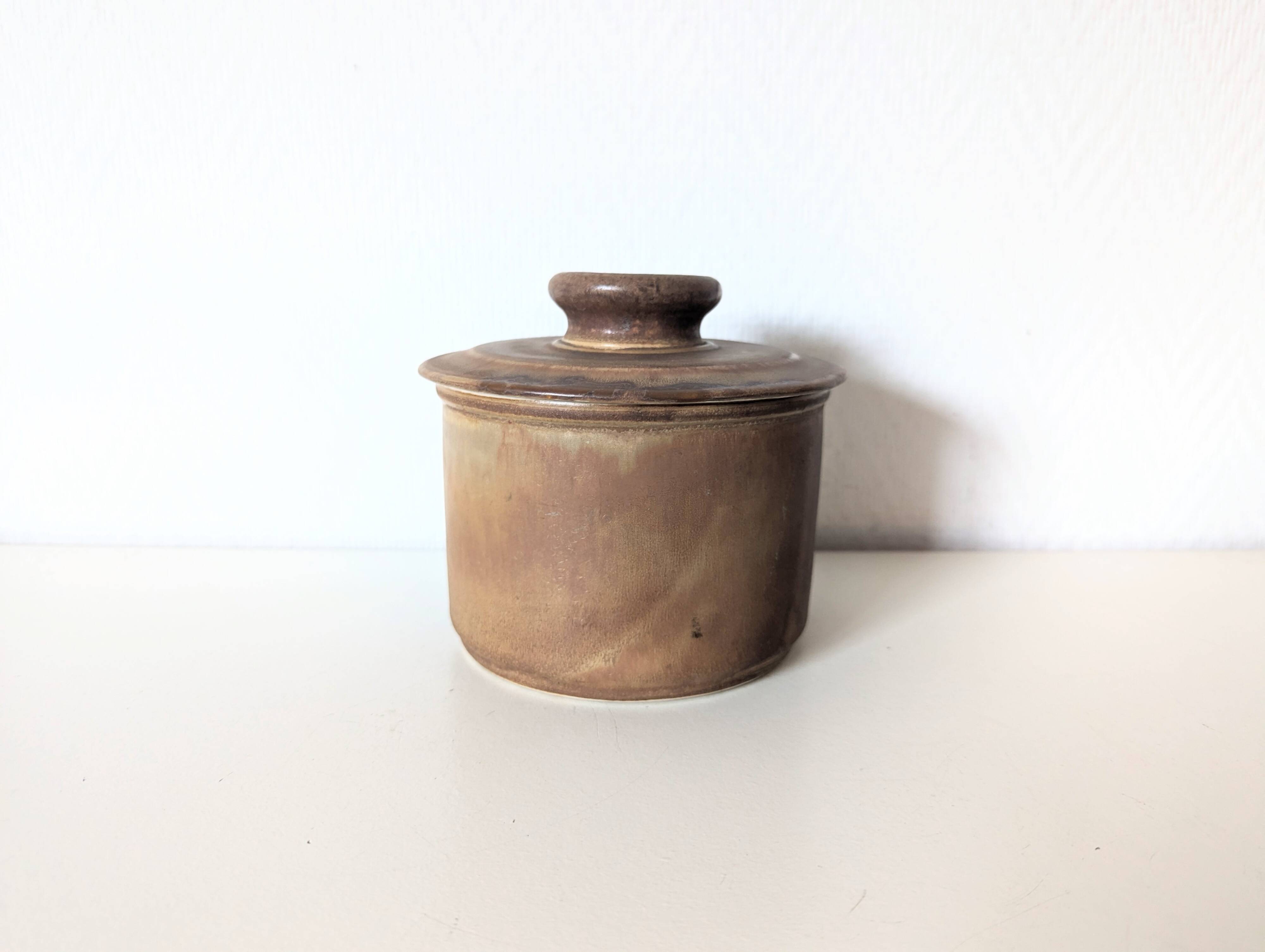 brown stoneware water butter dish