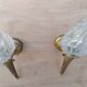 Paire d'appliques flambeau vintage en bronze