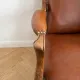 Classic vintage armchair in brown leather and oak