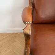 Fauteuil vintage classique en cuir marron et chêne