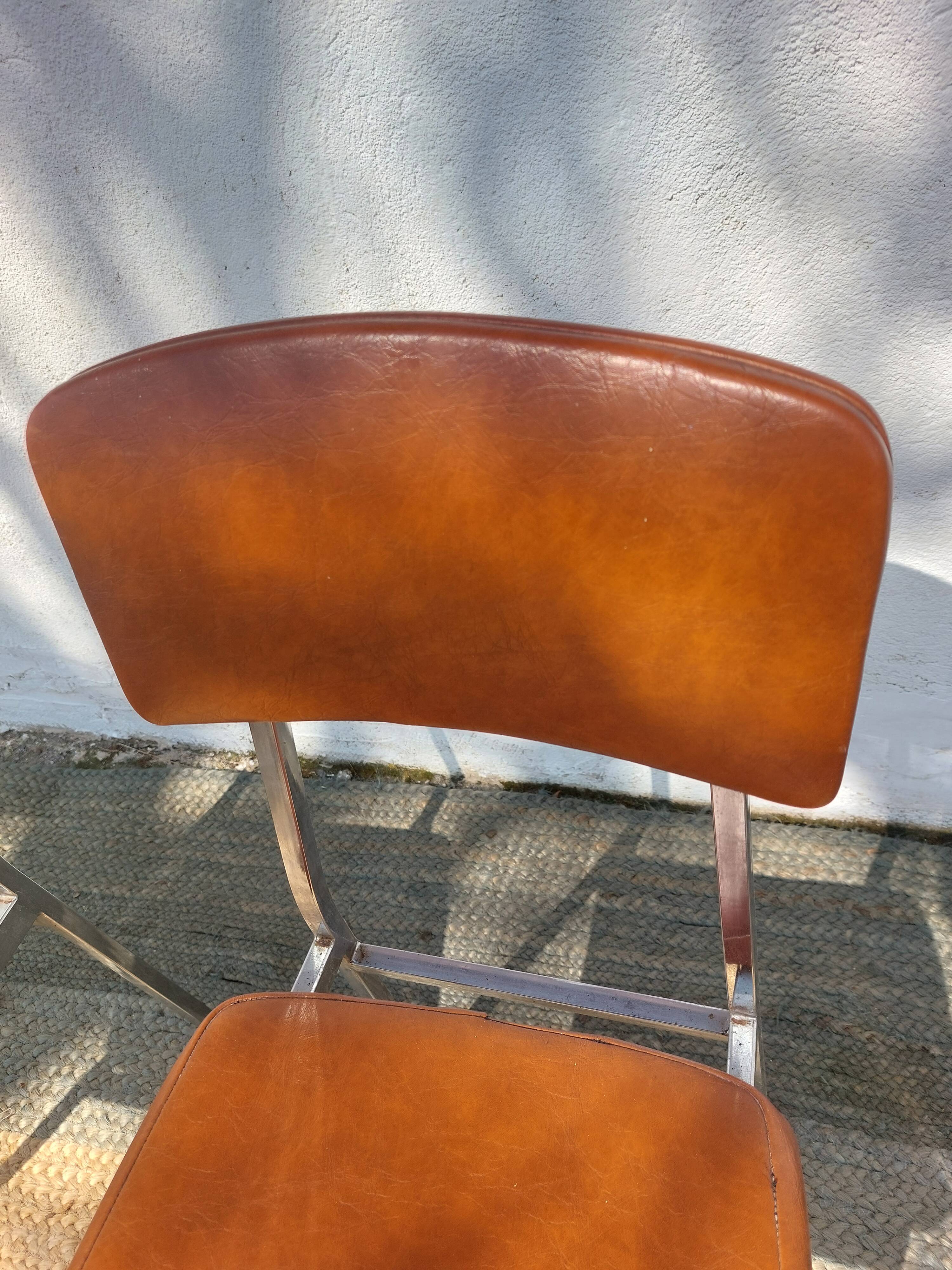 3 stainless steel tube chairs and faux leather, vintage