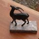 Vintage antelope gazelle bookend in patinated metal on a marble base.