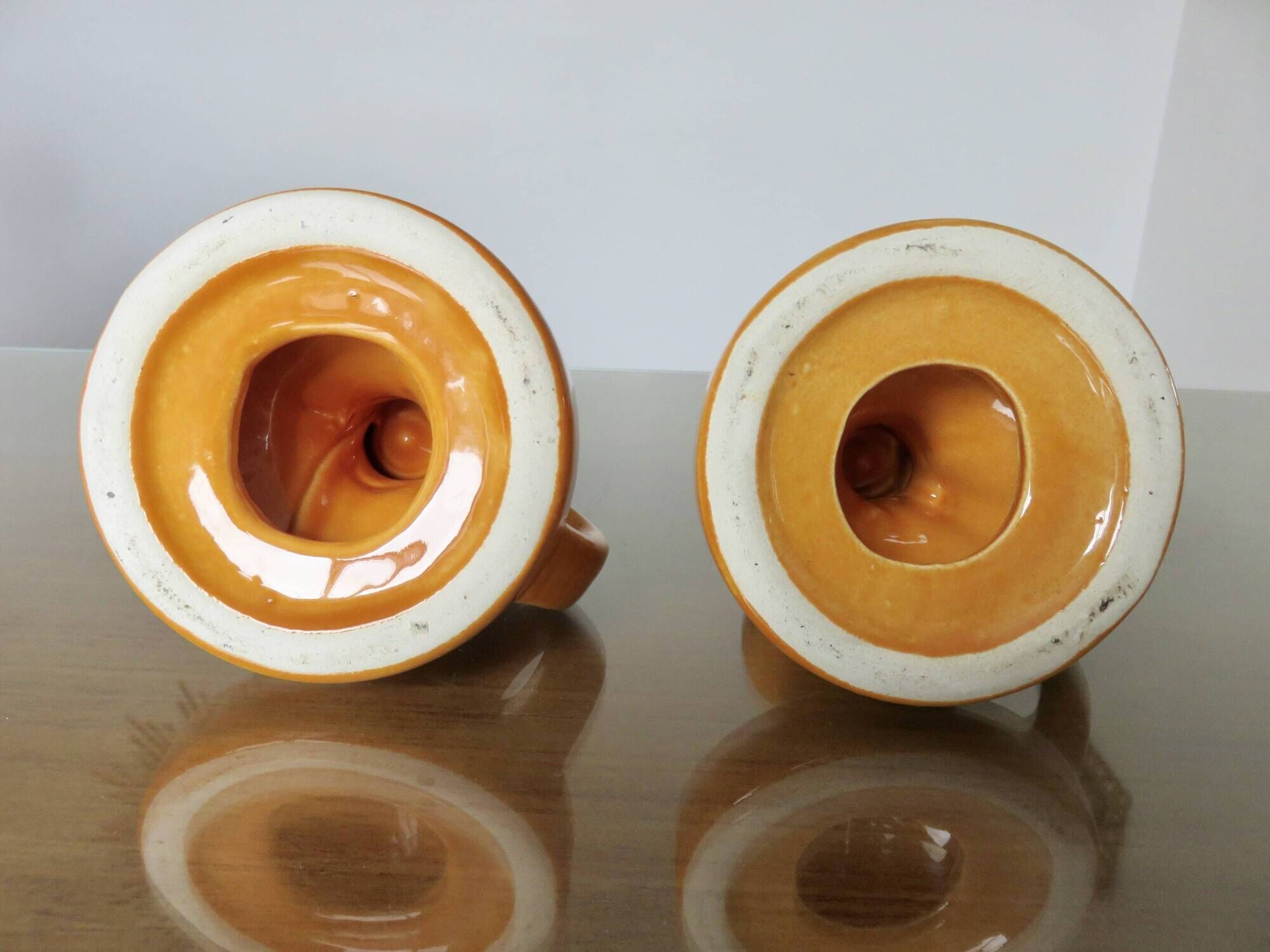 Pair of orange ceramic candlesticks from the 60s