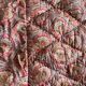 Vintage duvet/bedspread with a paisley pattern.