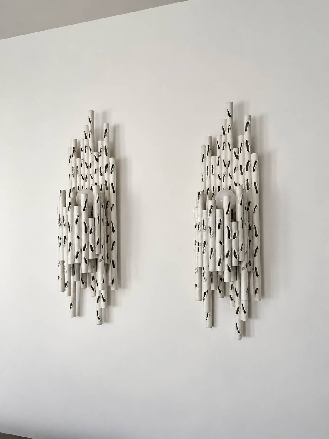 Pair of brutalist wall sconces attributed to Marcello Fantoni – Italy, 1960s