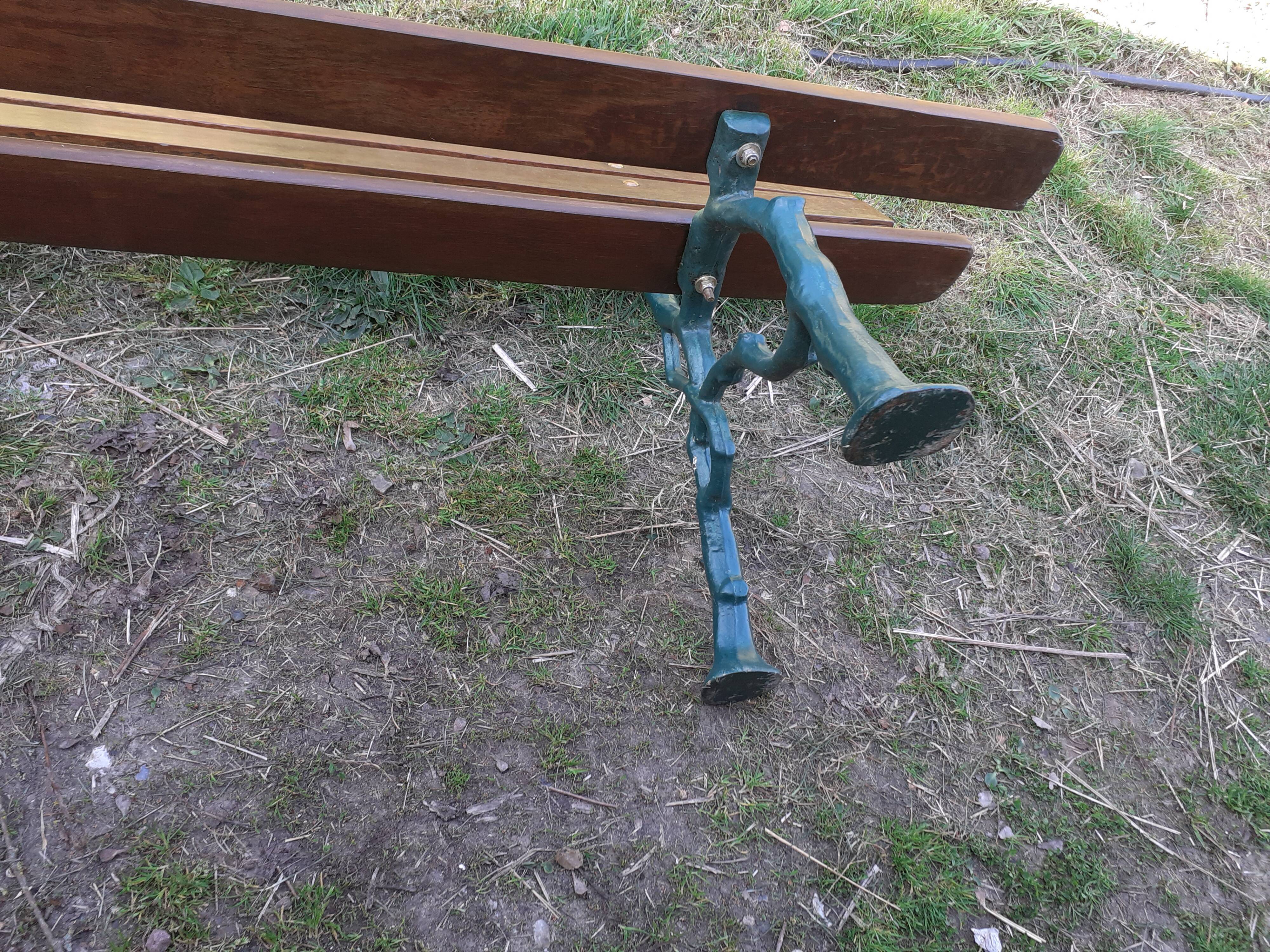 Old garden bench with cast iron feet