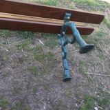 Old garden bench with cast iron feet
