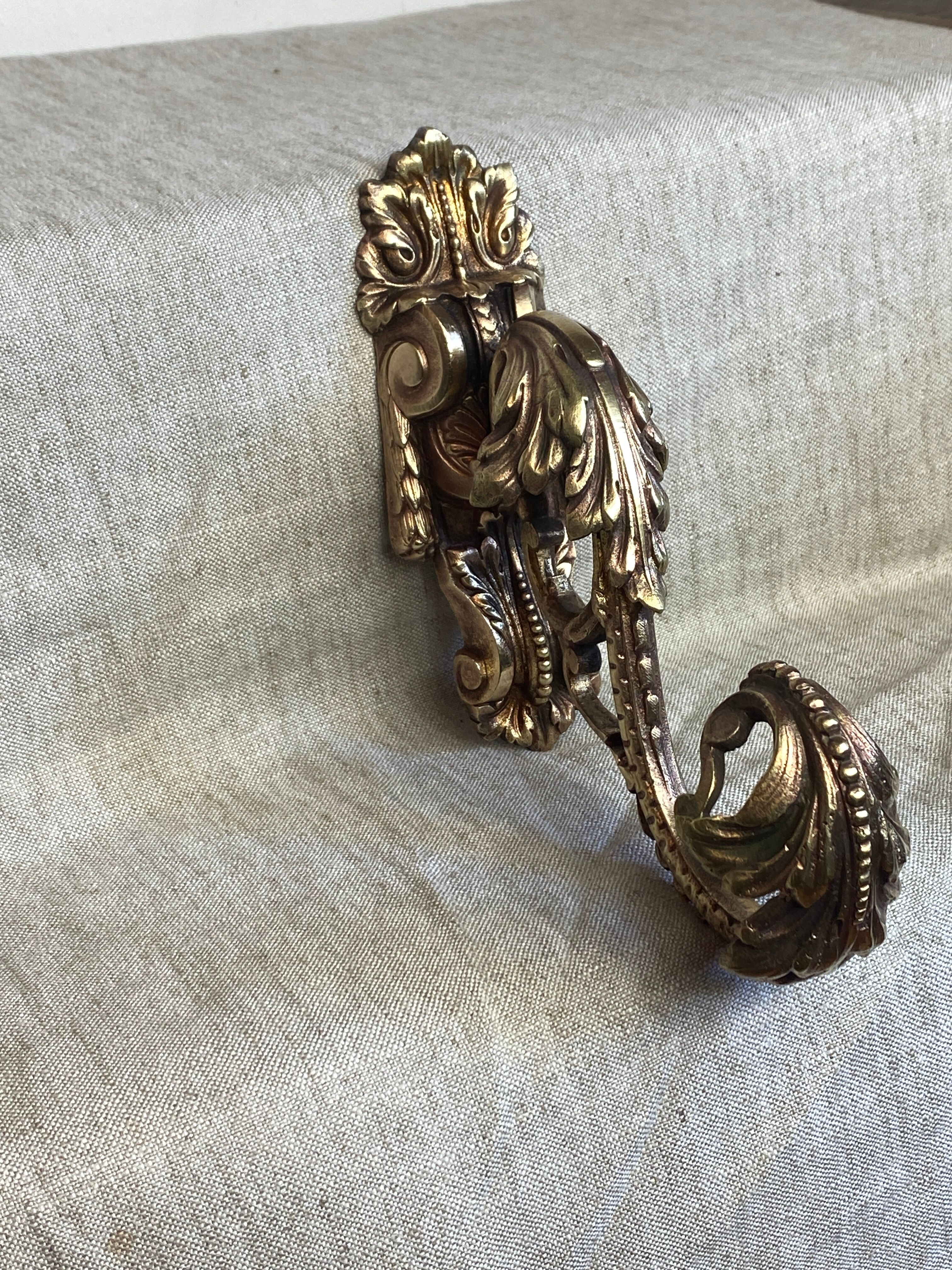 Golden bronze coat hook, 19th century