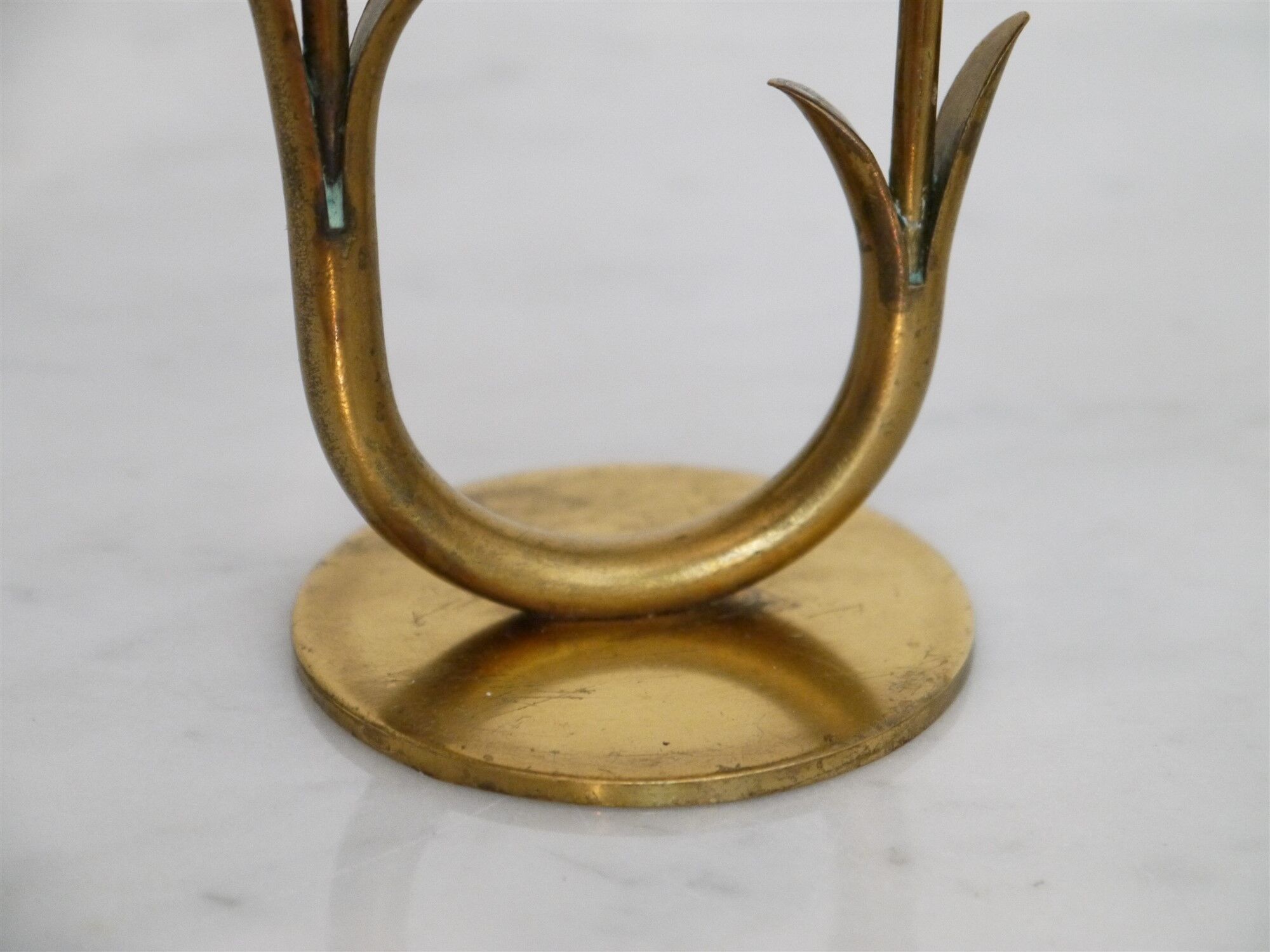 Pair of Scandinavian candlesticks made of brass and glass