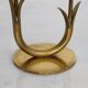 Pair of Scandinavian candlesticks made of brass and glass