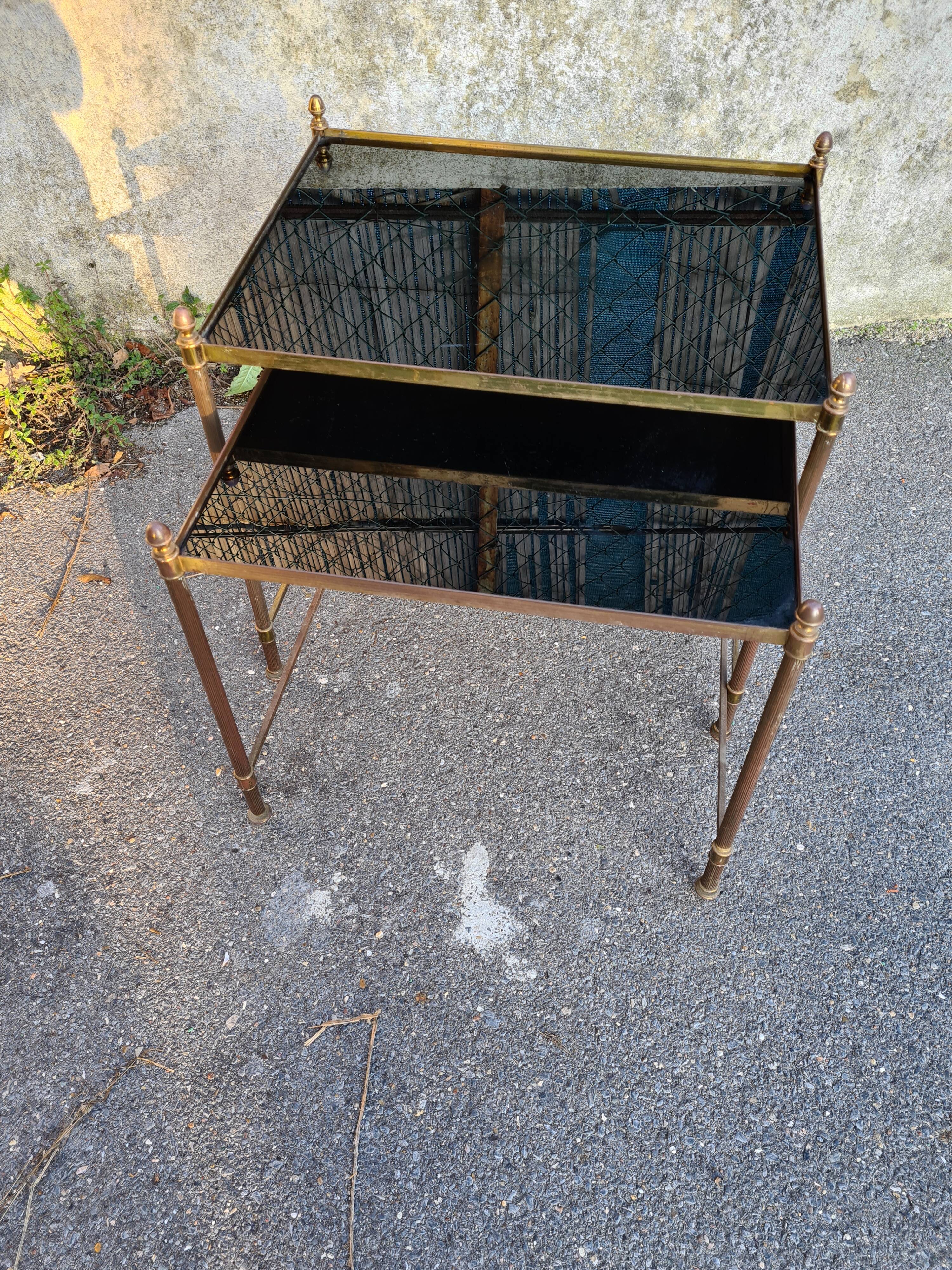 2 brass trundle tables and vintage black glass