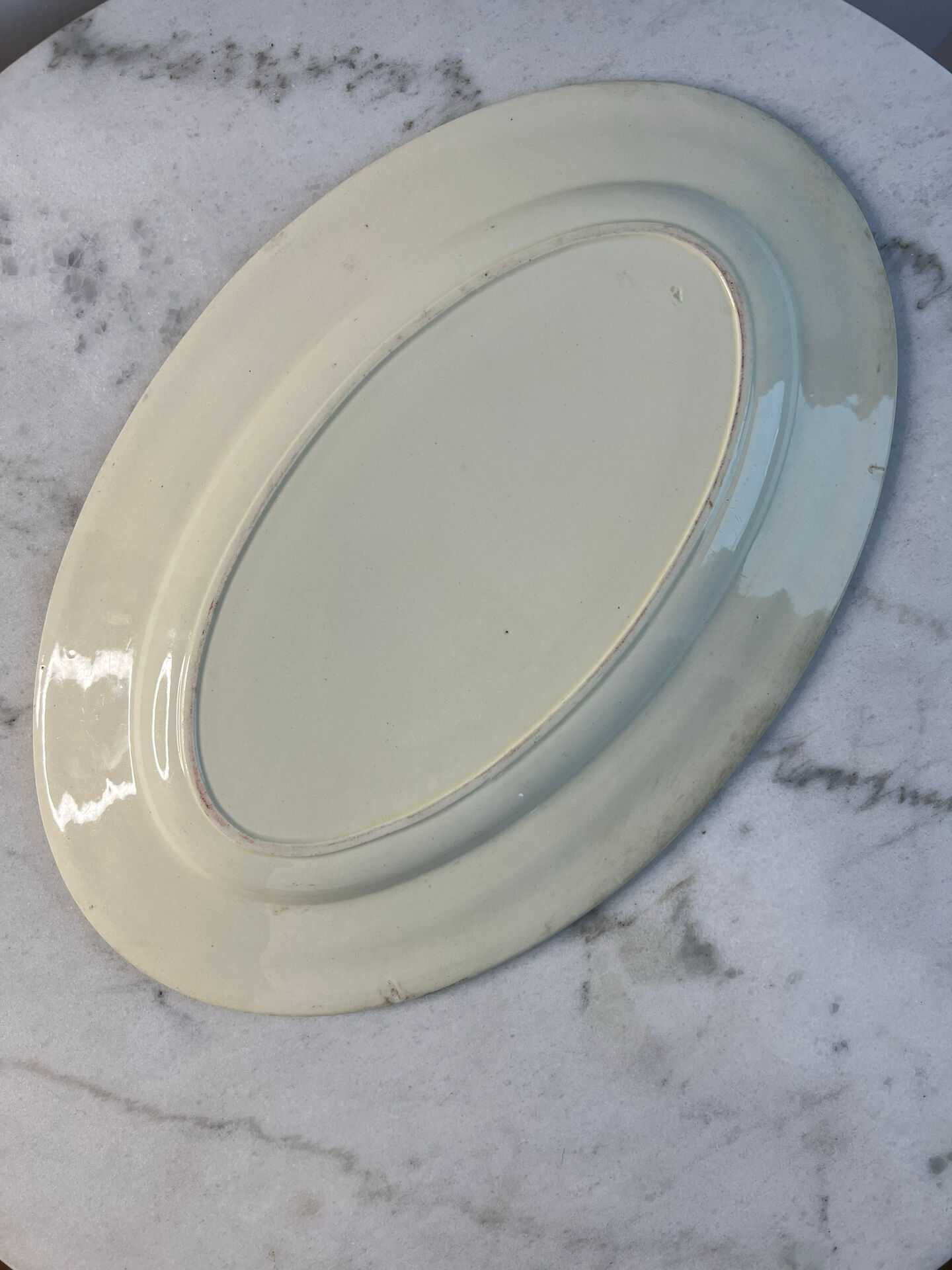 Grand plat ovale en terre de fer 41x27cm